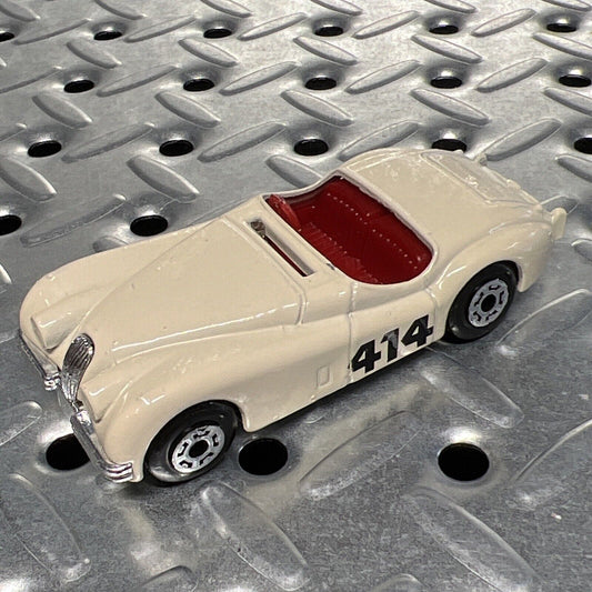 Matchbox JAGUAR XK 120 WHT W/ RED SEATS, BLK WHEELS, & CHROME GRILL #414