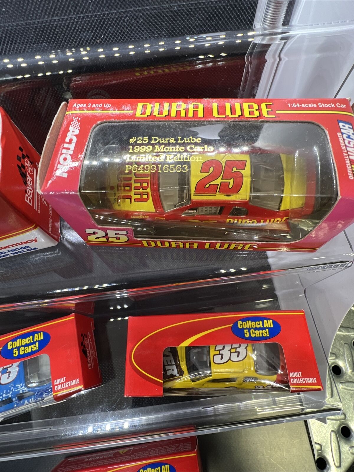 ACTION RACING NASCAR 1999 MONTE CARLO DURA LUBE #25 RED STOCK CAR PROMO 99’ + 4